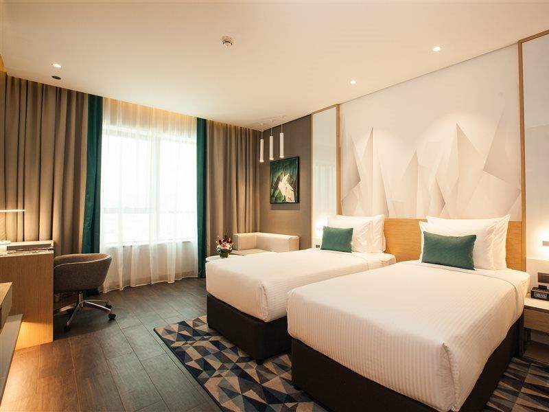 Flora Inn Hotel Dubai Airport Eksteriør billede A room at the hotel